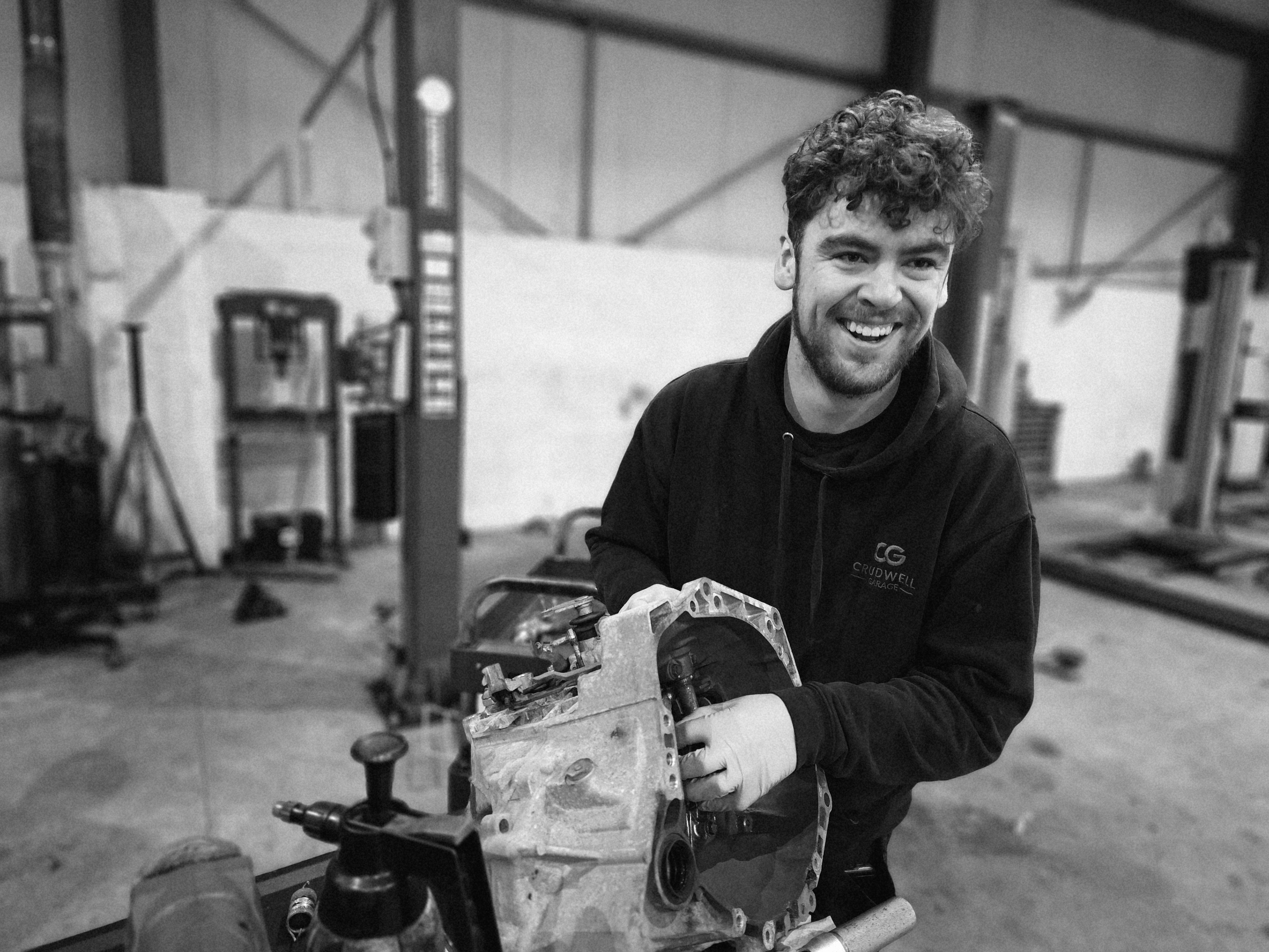 Josh working on a gearbox in the workshop